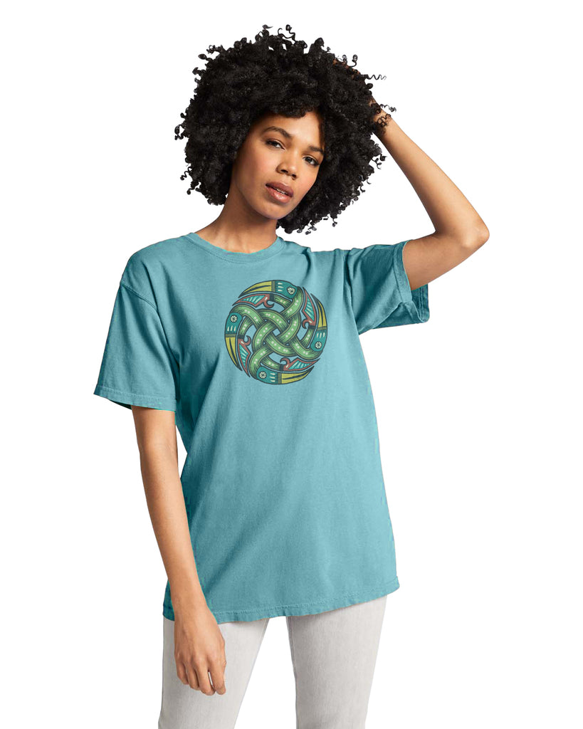 Smiling Woman wearing rugged Sapphire Blue T-Shirt with authentic Viking Norse shield design