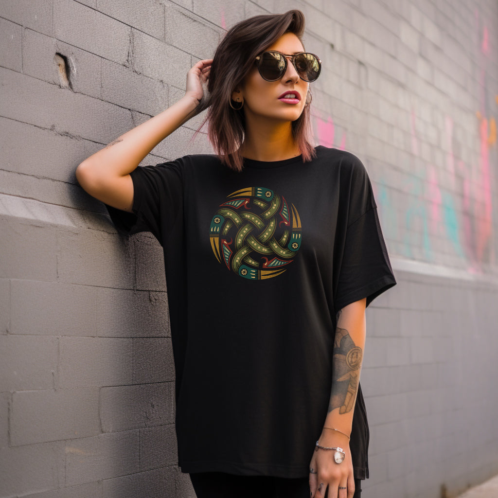 Woman against urban wall wearing rugged Black T-Shirt with authentic Viking Norse shield design